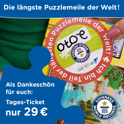 Ravensburger Spieleland_Events_Puzzle-Weltrekordversuch_Familie beim puzzeln
